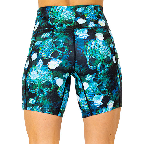back view of 7 inch green colored mermaid skull patterned shorts