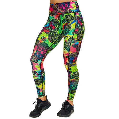 front view of full length colorful tie dye leggings with black skull pattern