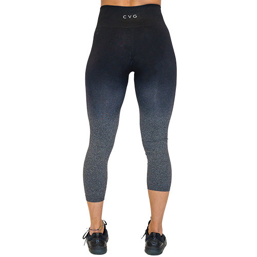 Photo of the back of the black ombre capri length leggings. These are black at the top and fade to grey at the bottom of the legs.