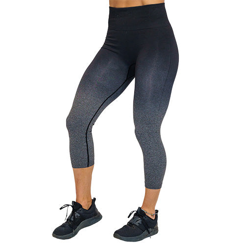 Photo of black ombre capri length leggings. These are black at the top and fade to grey at the bottom of the legs.