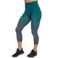 Photo of teal ombre capri length leggings. These are teal at the top and fade to grey at the bottom of the legs.