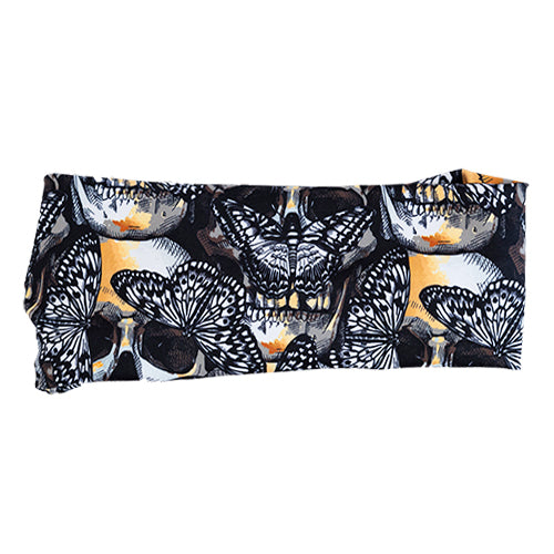 front view of headband with black and yellow skull and butterfly design