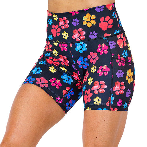 front view of 5 inch black shorts with multicolored paw prints 