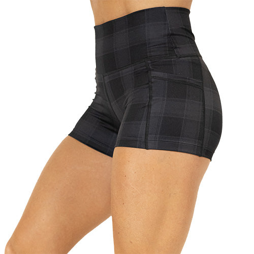 side view of 2.5 inch black plaid shorts 