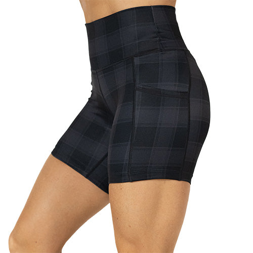 side view of black plaid 5 inch shorts 