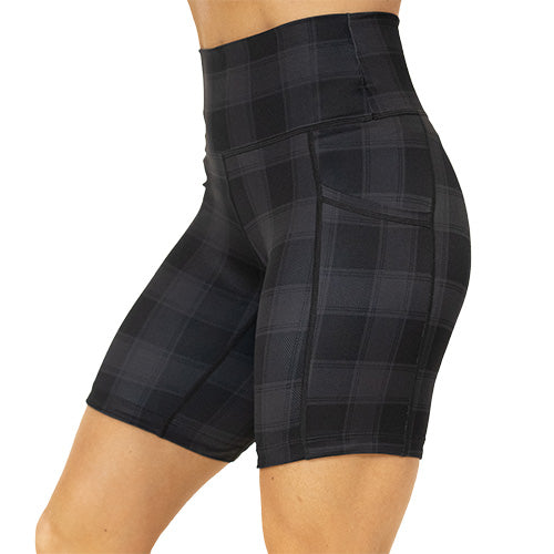 side view of 7 inch black plaid shorts 