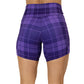 back view of 5 inch purple plaid shorts 