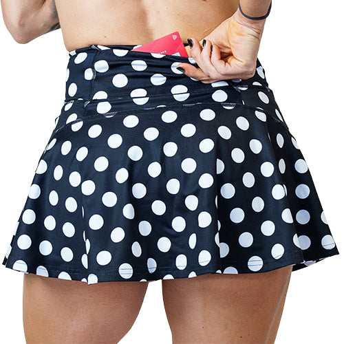 back pocket view on 3.75 inch black solid skirt with white polka dots