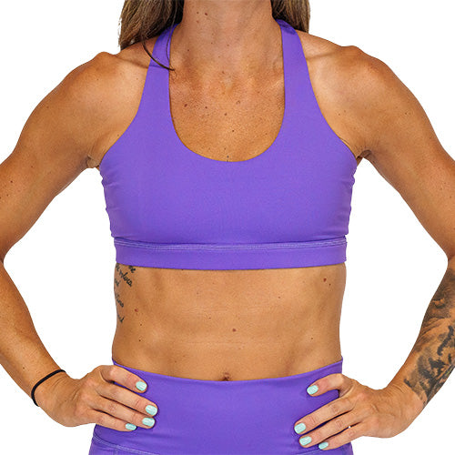 front view of solid purple sports bra