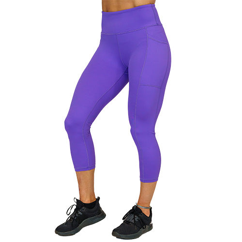 side view of capri length solid purple leggings