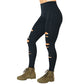 Photo of the black tear it up full length leggings. These have rips in the front of the leggings.