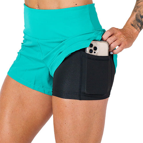 close up of side pocket on underneath layer of shorts, large enough to hold a cell phone