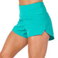 side view of teal green colored polyester shorts