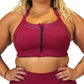 front view of solid maroon front zipper sports bra