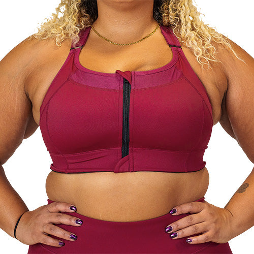 front view of solid maroon front zipper sports bra