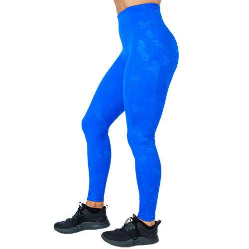 side view of full length blue leggings with blue unicorn pattern on it