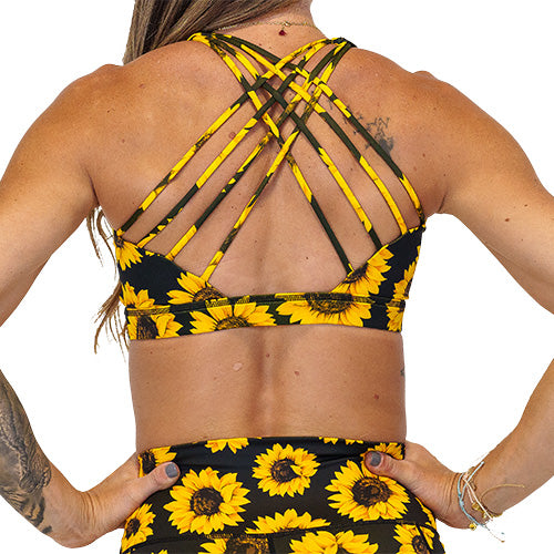 back view of the yellow flower sports bra