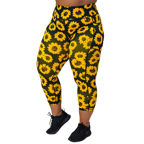 front view of capri length sunflower print leggings