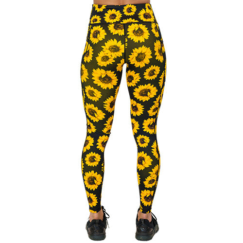 back view of full length sunflower print leggings