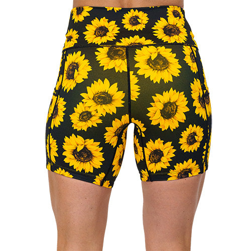 back view of the yellow flower pattern on 5 inch shorts against a white background