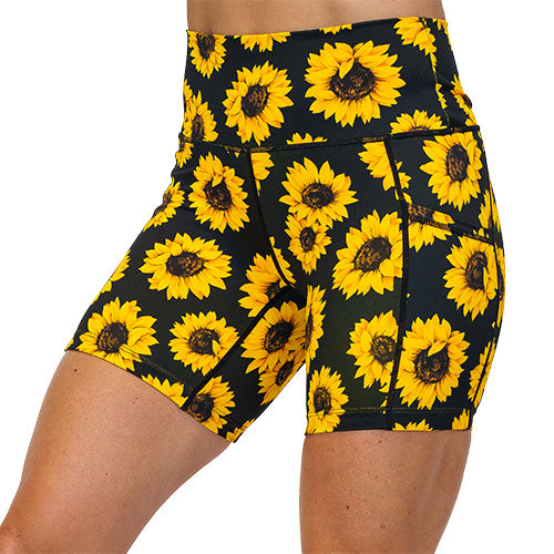 front view of yellow flower pattern on 5 inch shorts against a white background