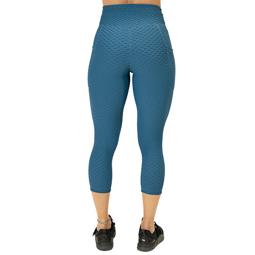 back view of solid teal textured print leggings