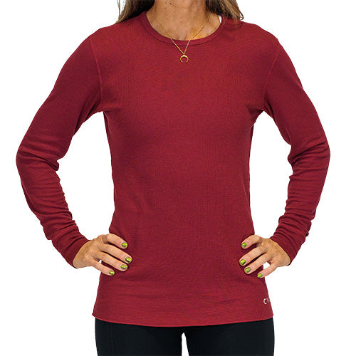 front of solid maroon thermal