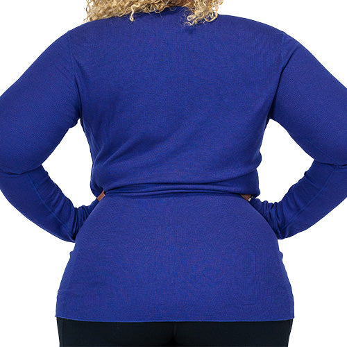 Photo of the back of a model wearing a navy long sleeve thermal..