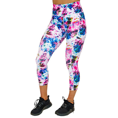 front view of capri length pink, blue, yellow and white tie dye print leggings