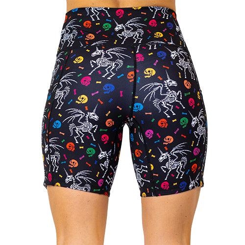 back view of unicorn skeleton and skulls pattern on 7 inch shorts 