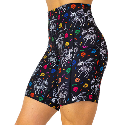 side view of unicorn skeleton and skulls pattern on 7 inch shorts 