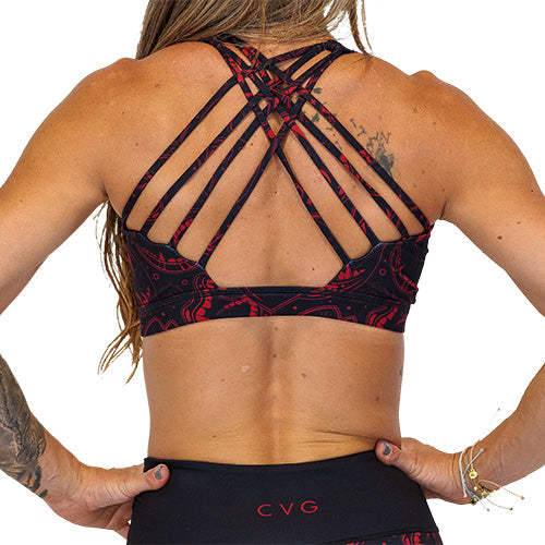 back of red and black vampire themed sports bra