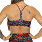 back view of criss cross strap design on rose and heart tattoo style patterned bra