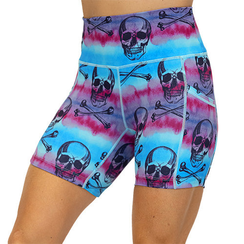 front view of blue, purple and pink watercolor and skull design on 5 inch shorts 