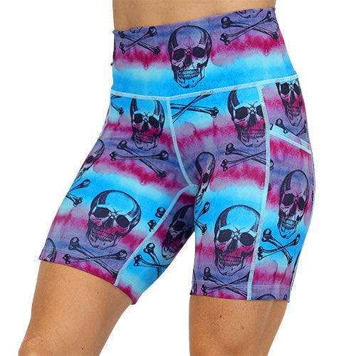 front view of blue, purple and pink watercolor and skull design on 7 inch shorts