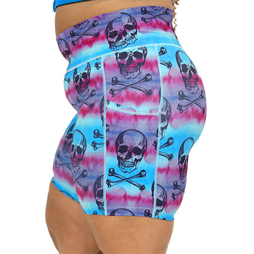 side view of blue, purple and pink watercolor and skull design on 7 inch shorts