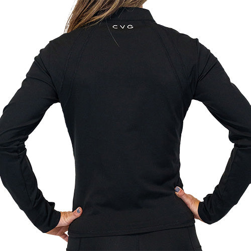 Photo of the back of a model wearing a black zip up track jacket.