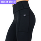 close up of solid black leggings with mini skull and barbells logo on side pocket, with graphic in the top left corner saying "Back in stock"