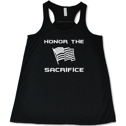 black tank with the saying "honor the sacrifice" and an American flag in white