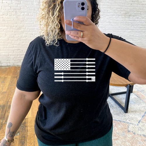 black unisex shirt with a white barbell American flag design in the center