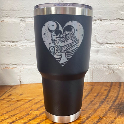 30oz black tumbler with skeletons, the moon and stars in a heart