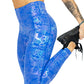 Model stretching wearing blue glisten here leggings