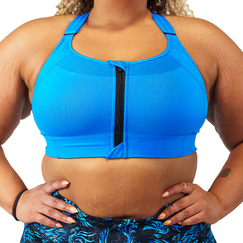 front view of solid blue front zipper sports bra