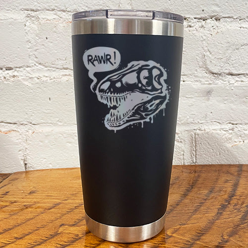 black 20oz tumbler with silver dino skull with speech bubble saying "rawr!"