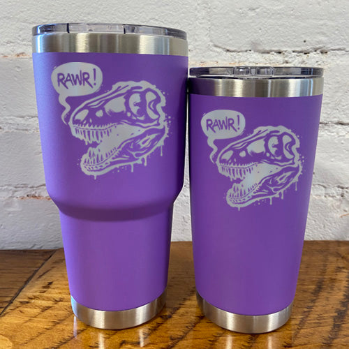 30oz and 20oz purple tumblers with silver dino skull with speech bubble saying "rawr!"