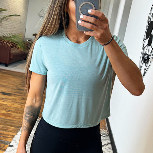 front view of solid light blue cropped t shirt