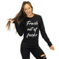 front view of heather black colored long sleeve shirt with saying in the color white