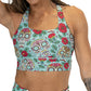 front view of teal, green, yellow, pink and white sugar skull print longline bra