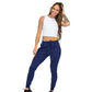 full body photo of model wearing navy joggers and a white fitted crop top