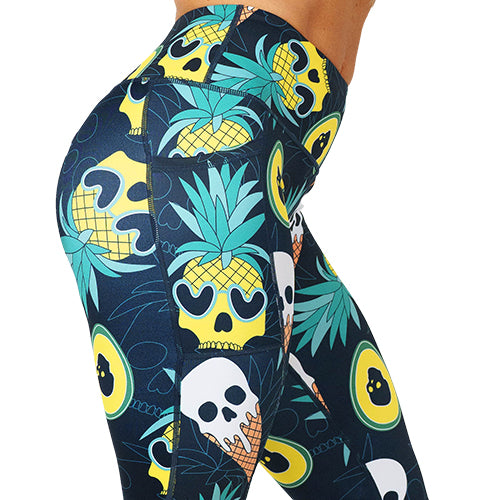 close up of skull pineapple and ice cream cone print leggings